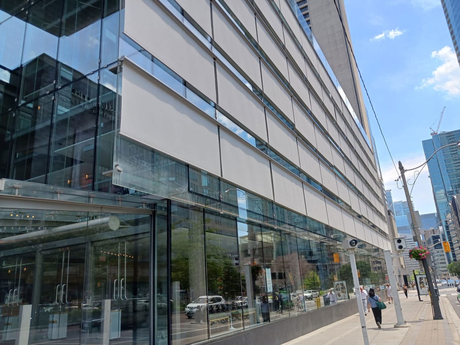 Exterior roller shades — cultural center