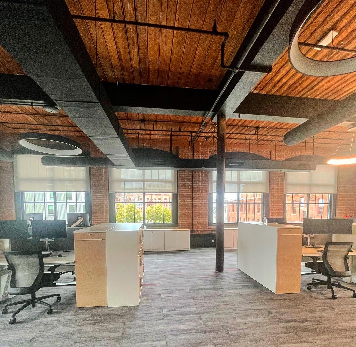 Roller shades — open-plan loft office